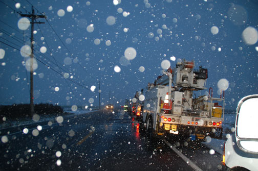 Utility vehicles in storm