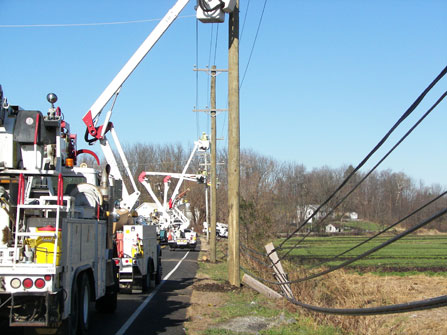 Service trucks repairing telephone lines