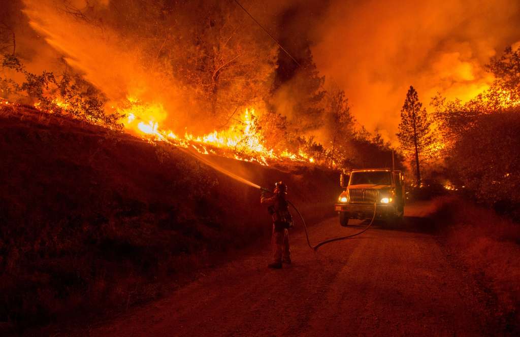 firefighter fighting butte fire