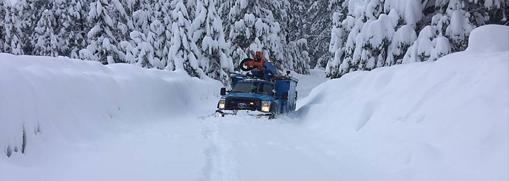 truck traversing through snow