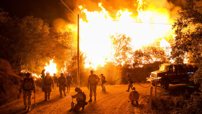 Firefighters fighting fire